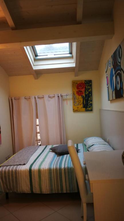 Postel nebo postele na pokoji v ubytování Relais Il Nido