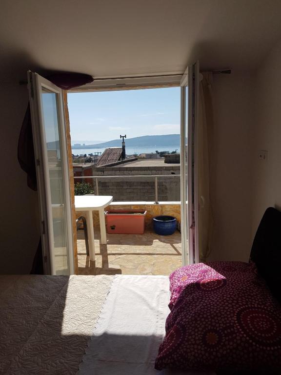 Posteľ alebo postele v izbe v ubytovaní Apartment Dijana
