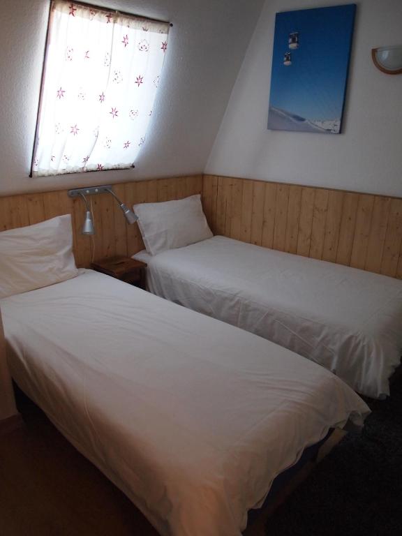 Postel nebo postele na pokoji v ubytování Alpine Hideout