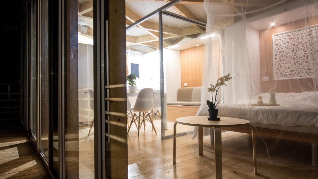 Posteľ alebo postele v izbe v ubytovaní Ecosuite & SPA