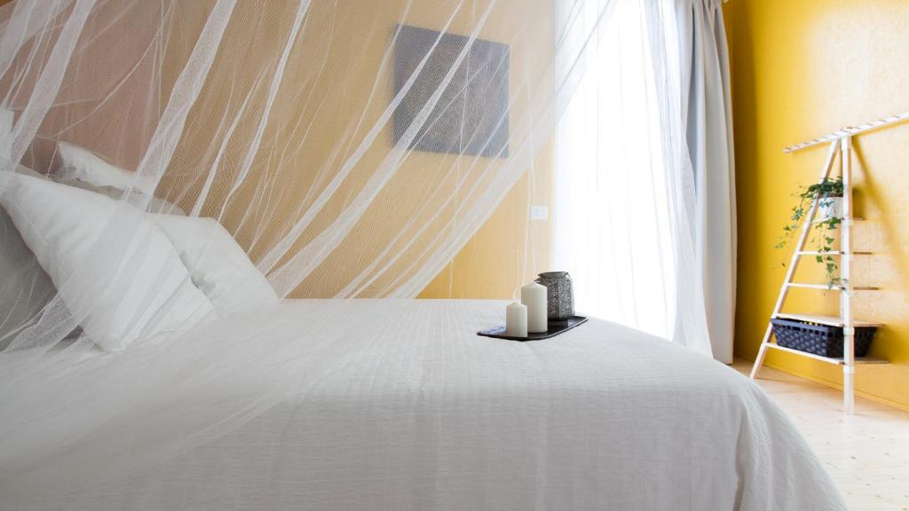 Posteľ alebo postele v izbe v ubytovaní Ecosuite & SPA