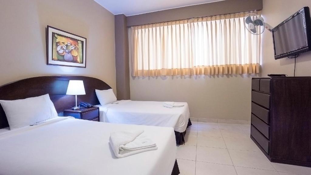 Postel nebo postele na pokoji v ubytování Suites Larco 656 Miraflores Lima
