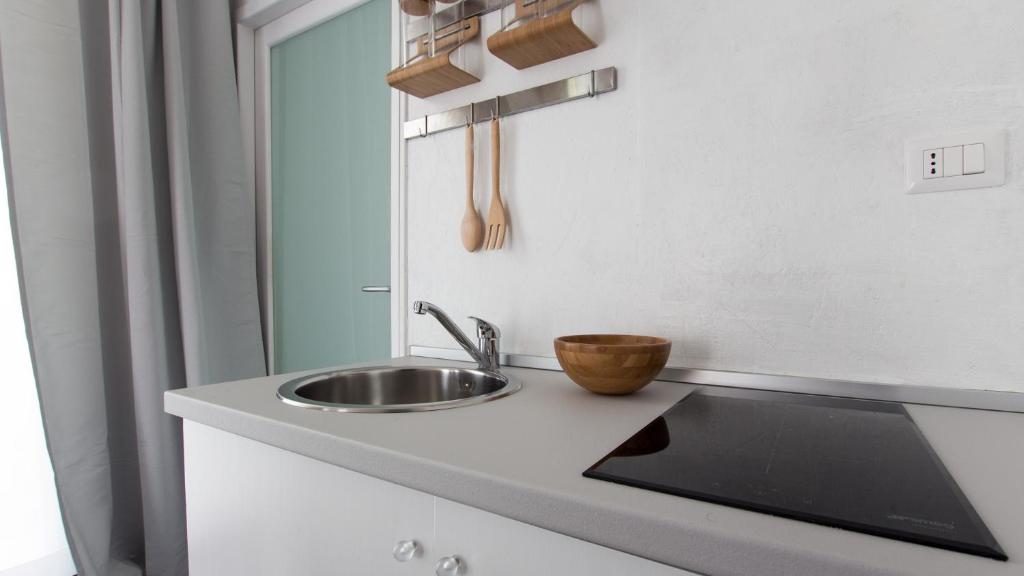 Kuchyňa alebo kuchynka v ubytovaní Ecosuite & SPA