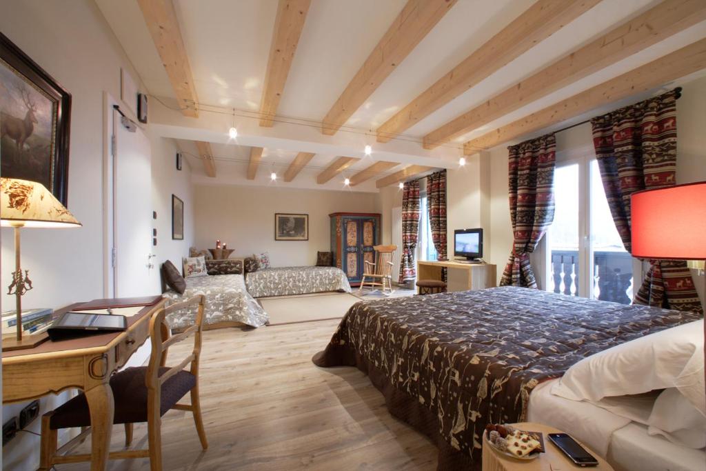 Postel nebo postele na pokoji v ubytování Hotel Savoia dal 1924