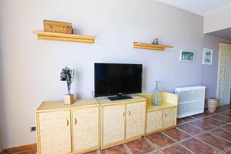 TV a/nebo společenská místnost v ubytování Eila