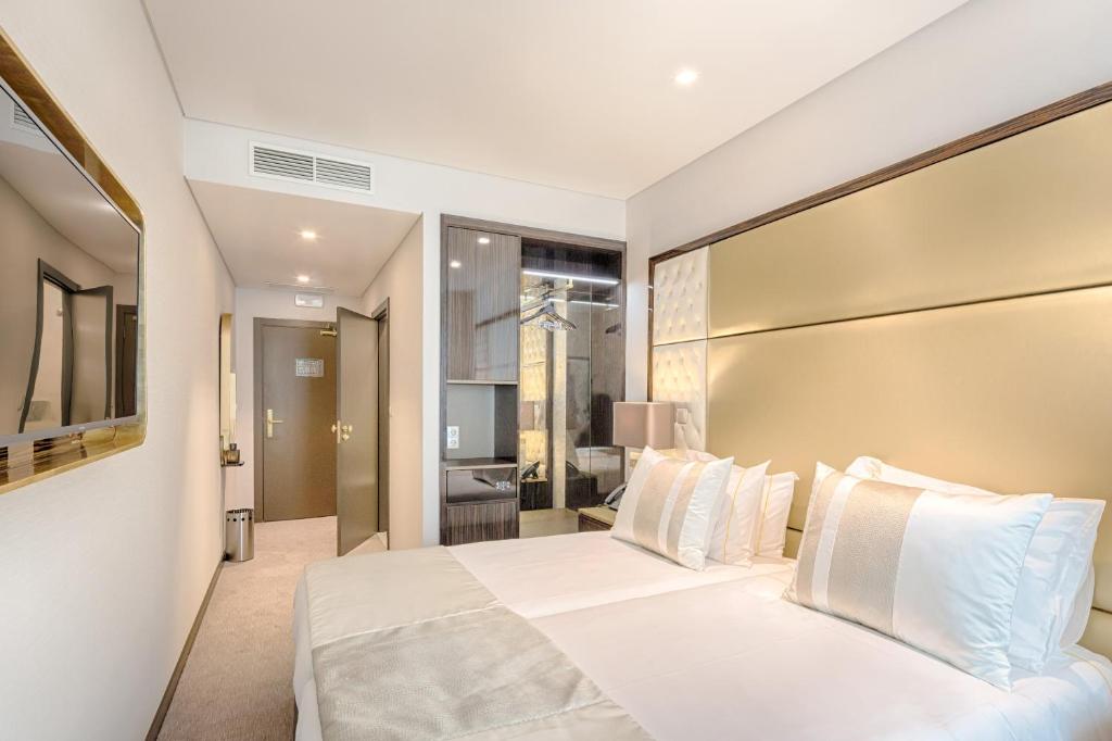 Hotel MeraPrime Gold Lisboa - Resim 45