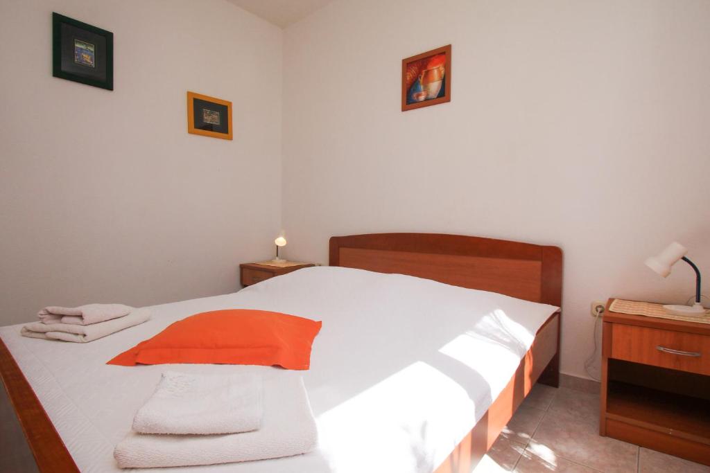 Posteľ alebo postele v izbe v ubytovaní Apartments Marketa
