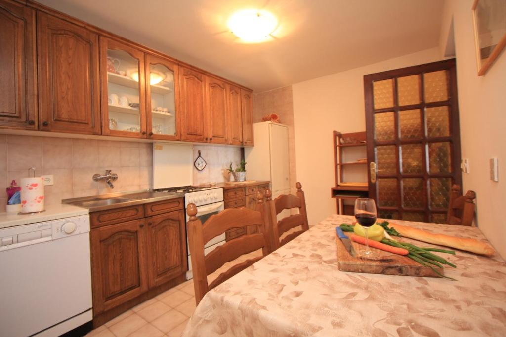 Kuchyňa alebo kuchynka v ubytovaní Apartments Marketa