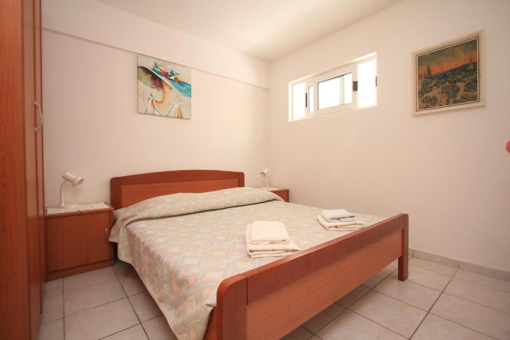 Posteľ alebo postele v izbe v ubytovaní Apartments Marketa