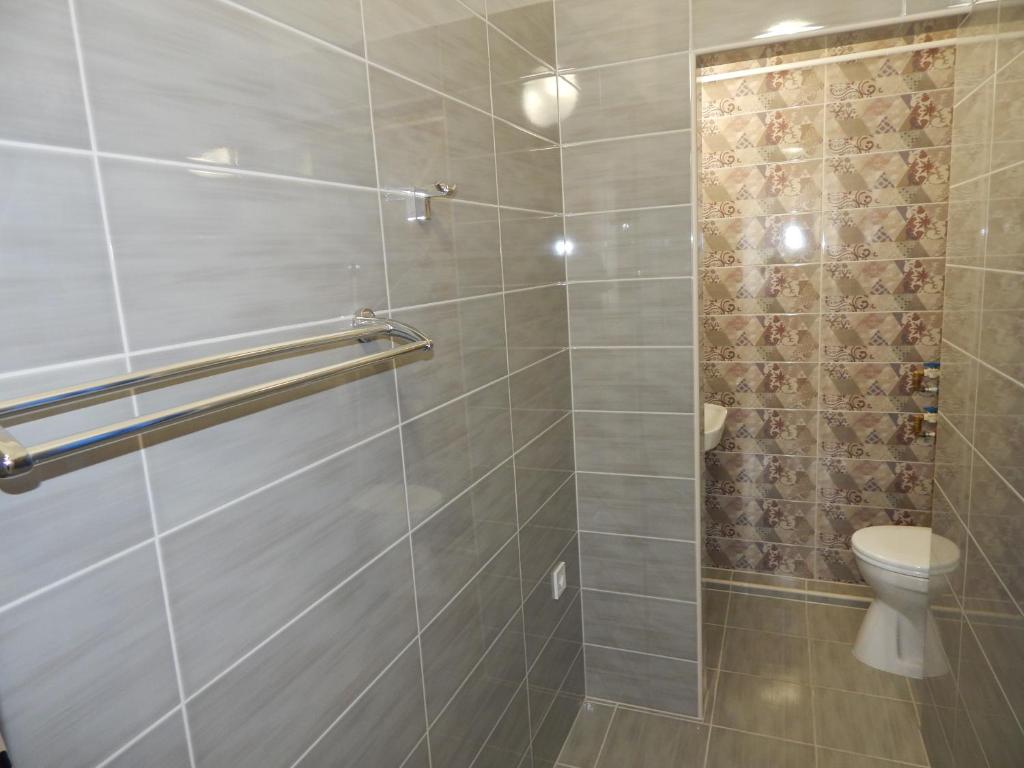 A bathroom at Kálvin Vendégszobák