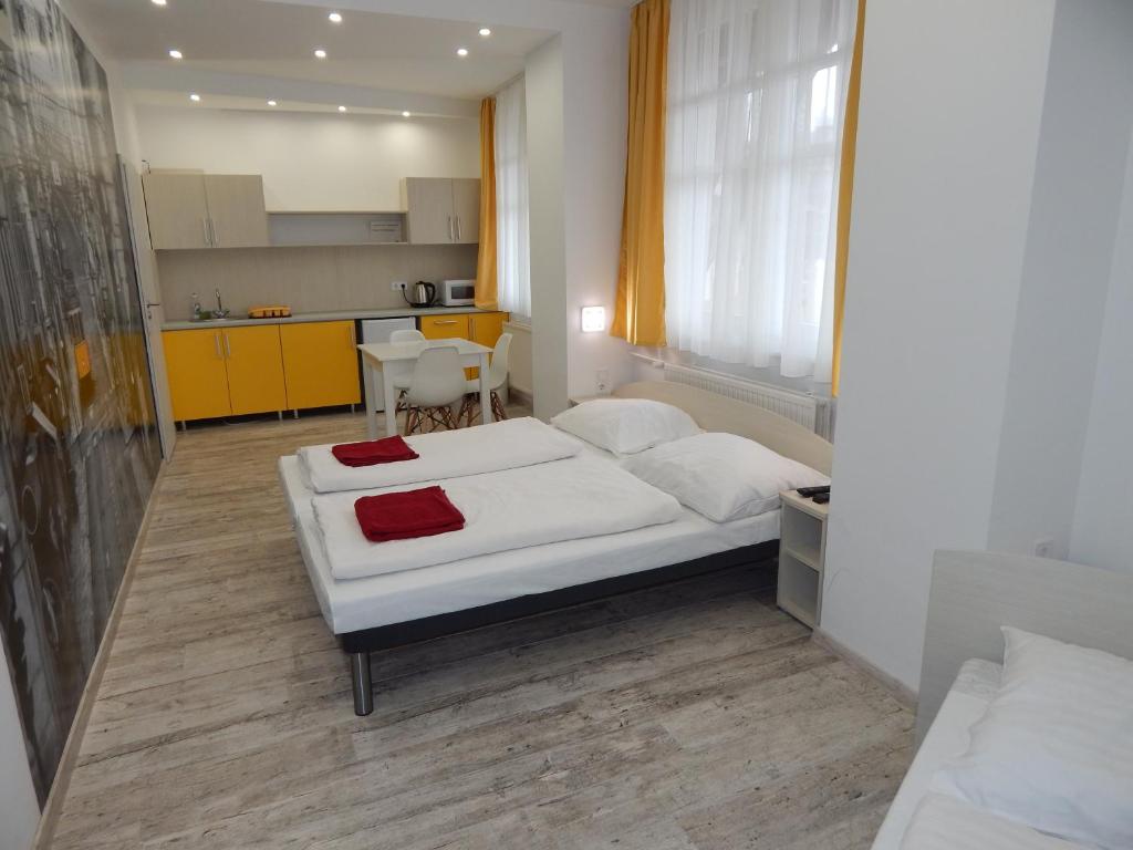 A kitchen or kitchenette at Kálvin Vendégszobák
