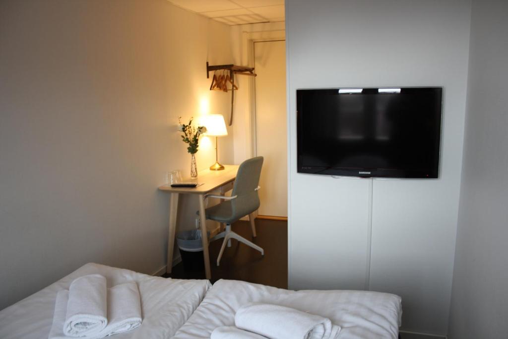 Postel nebo postele na pokoji v ubytování Grännagården Hotell och Restaurang