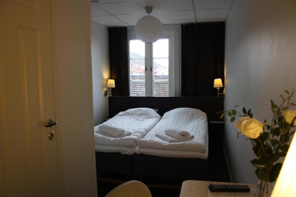 Postel nebo postele na pokoji v ubytování Grännagården Hotell och Restaurang