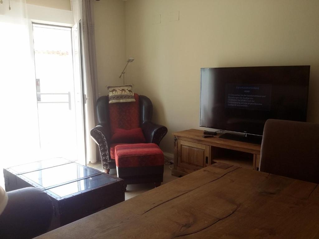 Telewizja i/lub zestaw kina domowego w obiekcie Ferienwohnung Tropical