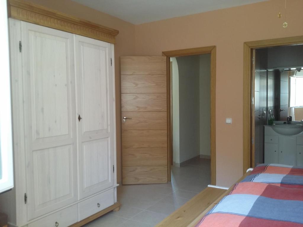 Łóżko lub łóżka w pokoju w obiekcie Ferienwohnung Tropical