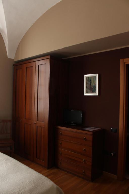 Postel nebo postele na pokoji v ubytování Albergo San Lorenzo
