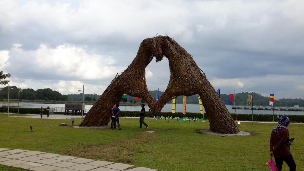 a sculpture of two horses in a field at Happy Home@Teega Residence Puteri Harbour in Nusajaya