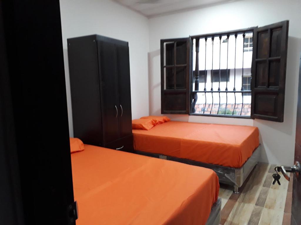 Postel nebo postele na pokoji v ubytování Hotel Mar y Luna