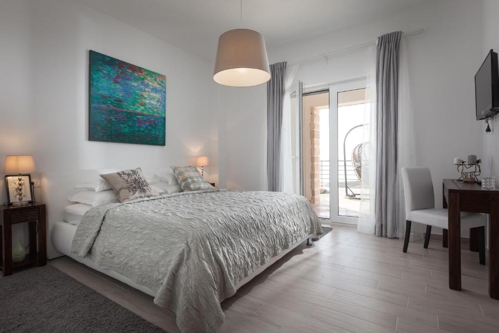 Posteľ alebo postele v izbe v ubytovaní Villa IVA, 3lovelyvillas