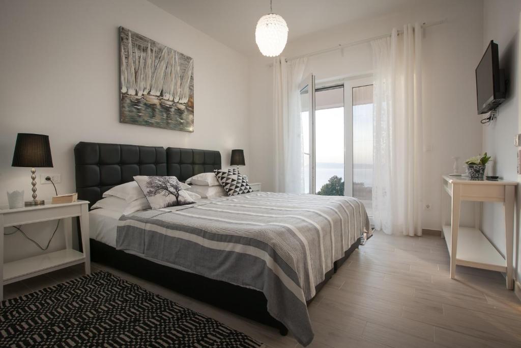 Posteľ alebo postele v izbe v ubytovaní Villa IVA, 3lovelyvillas