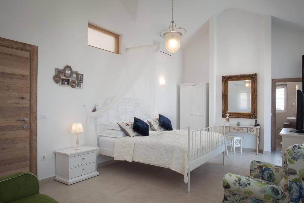 Posteľ alebo postele v izbe v ubytovaní Villa IVA, 3lovelyvillas