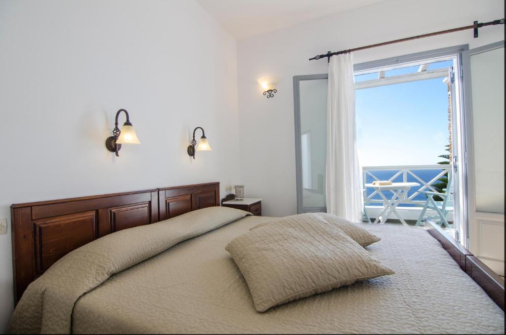 Postel nebo postele na pokoji v ubytování Hotel Katerina