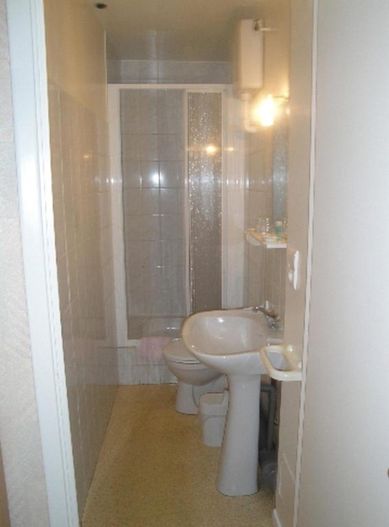 Koupelna v ubytování Hotel Magne