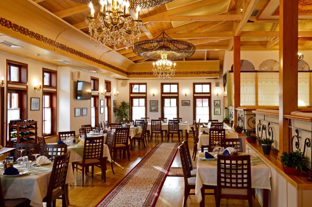 A restaurant or other place to eat at Sharm Hotel Luxury