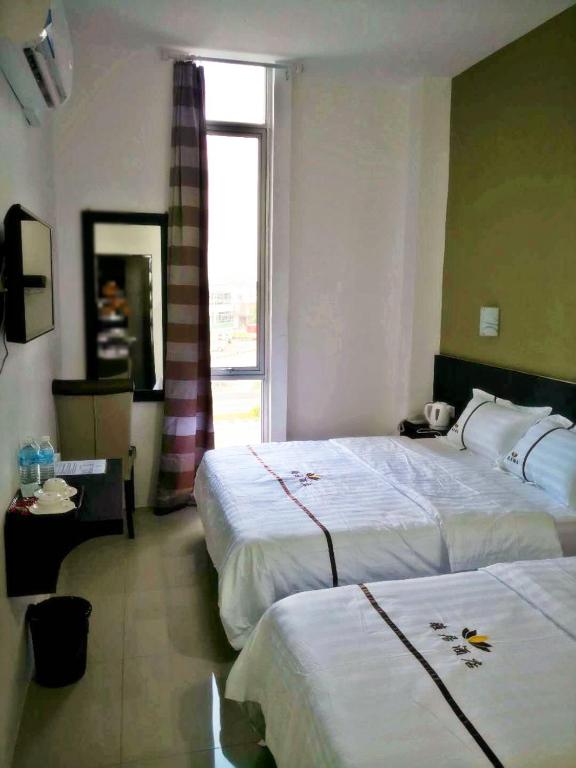 Postel nebo postele na pokoji v ubytování Comfort Inn