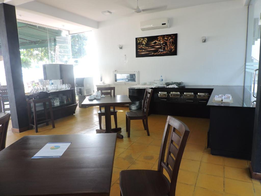 Kuchyň nebo kuchyňský kout v ubytování Joe's Resort Unawatuna