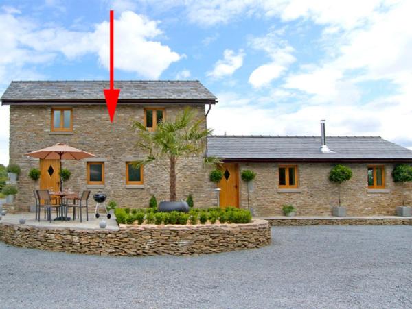 a house with a red arrow pointing at a house at Valley View in Ross on Wye