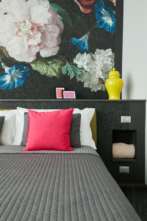 Postel nebo postele na pokoji v ubytování 15 Quindici by Serendipity Rooms