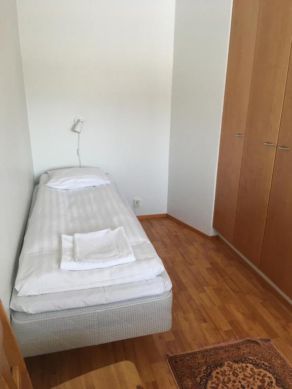 Кровать или кровати в номере Rukariutta Apartments