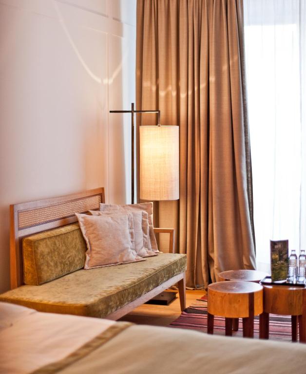 Postel nebo postele na pokoji v ubytování Louis Hotel