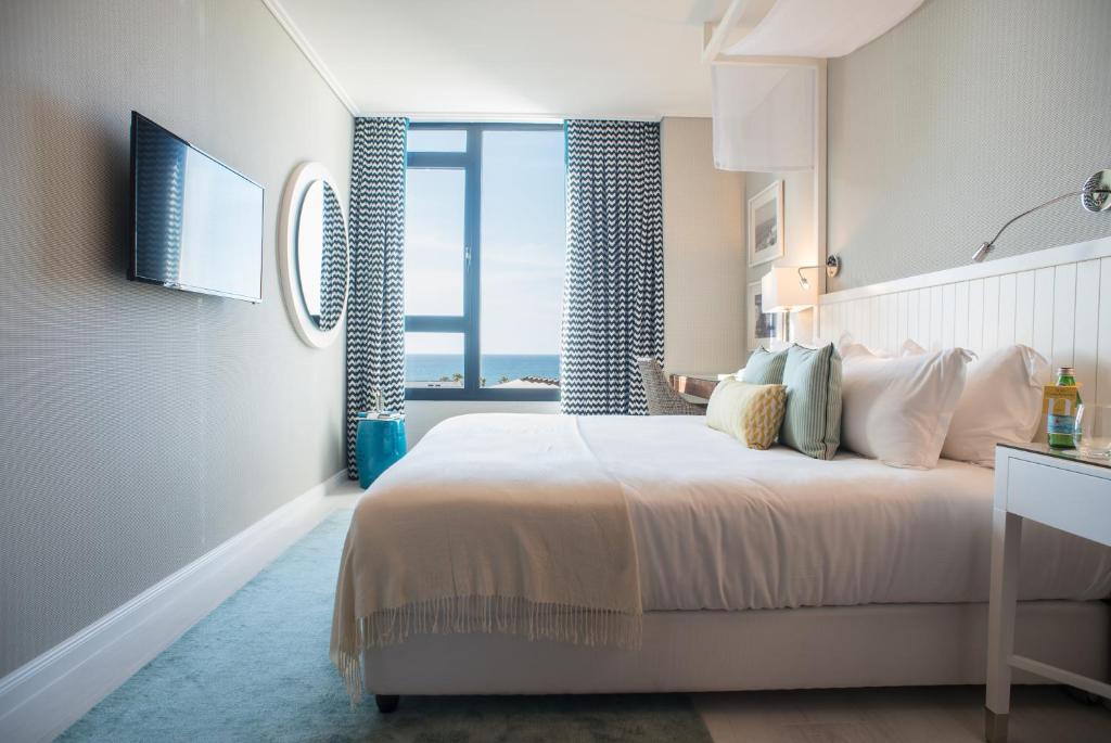 Postel nebo postele na pokoji v ubytování Melody Hotel - an Atlas Boutique Hotel