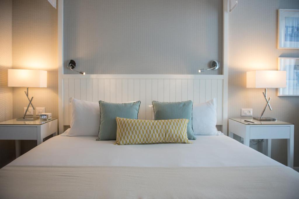 Postel nebo postele na pokoji v ubytování Melody Hotel - an Atlas Boutique Hotel