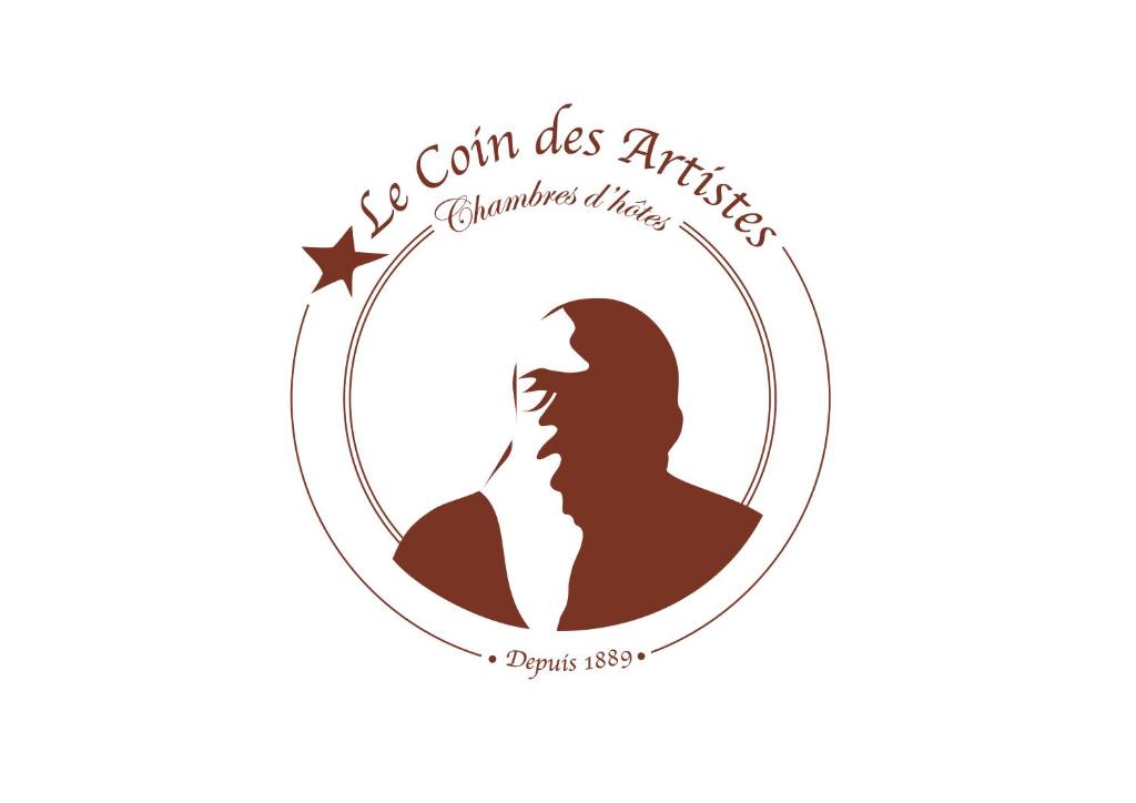 a silhouette of a woman with a star in a circle at Le Coin des Artistes in Giverny