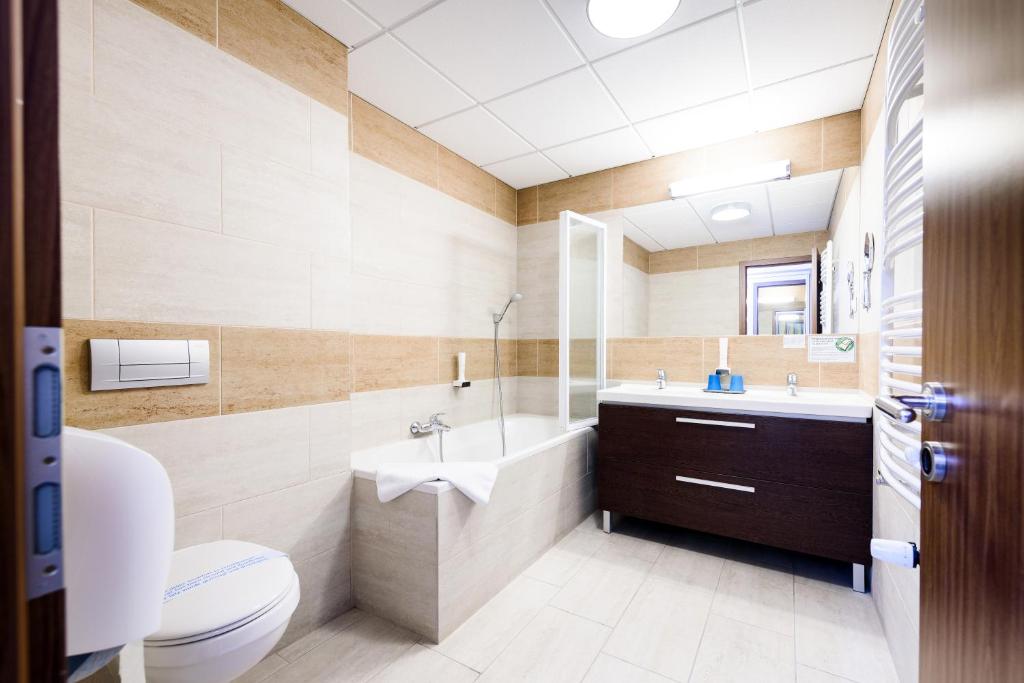 Koupelna v ubytování Hotel Garzon Plaza