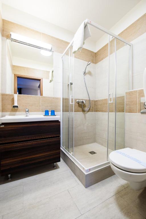 Koupelna v ubytování Hotel Garzon Plaza