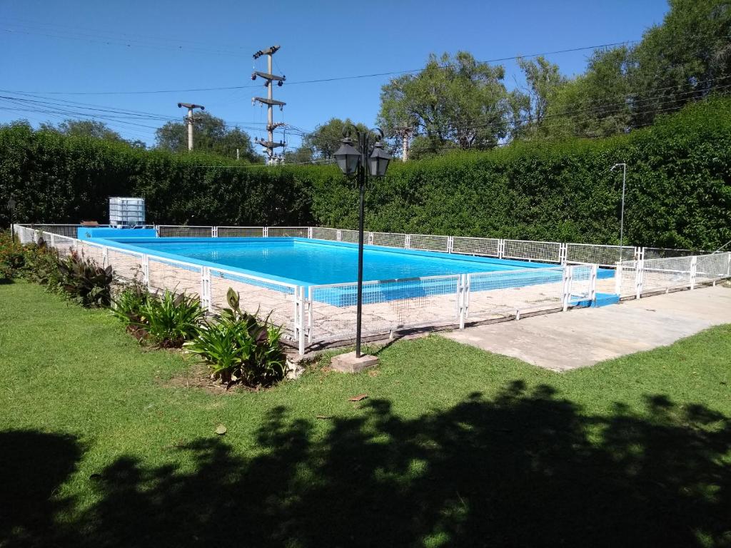 Bazén v ubytování Valle De Las Sierras Hotel nebo v jeho okolí