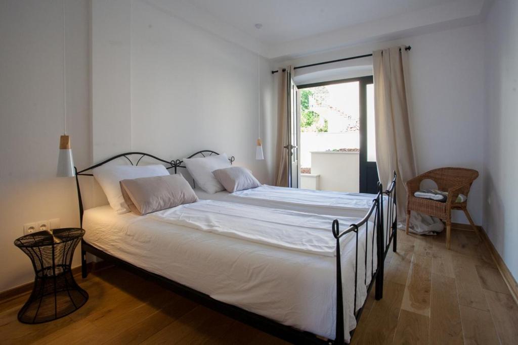 Posteľ alebo postele v izbe v ubytovaní Bella Vista Suites