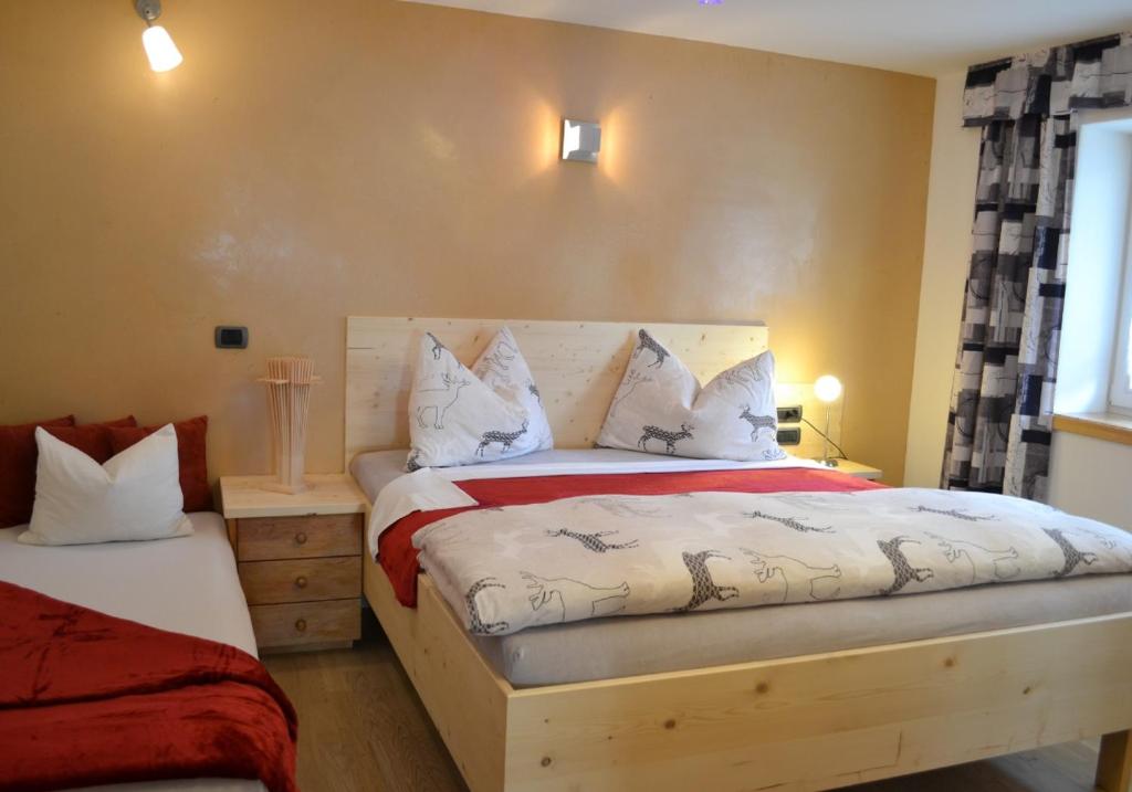 Posteľ alebo postele v izbe v ubytovaní Ferienwohnung Pramstaller