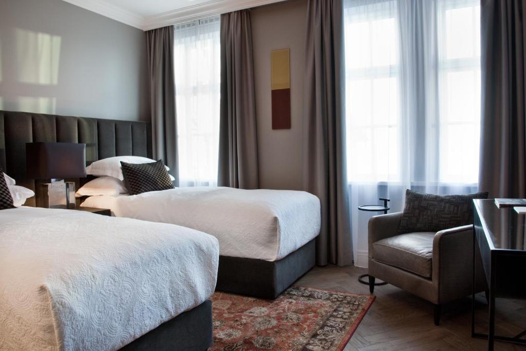 Postel nebo postele na pokoji v ubytování Sand Hotel by Keahotels