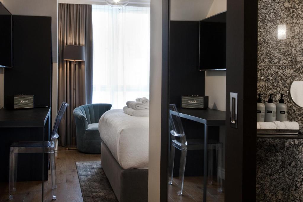 Postel nebo postele na pokoji v ubytování Sand Hotel by Keahotels