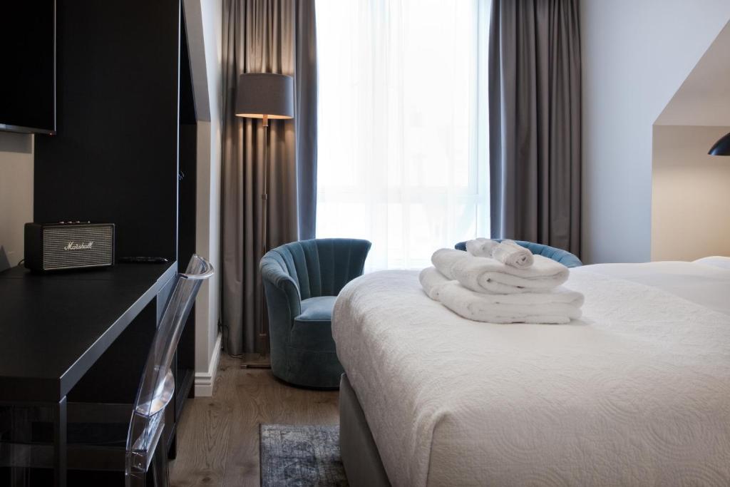 Postel nebo postele na pokoji v ubytování Sand Hotel by Keahotels