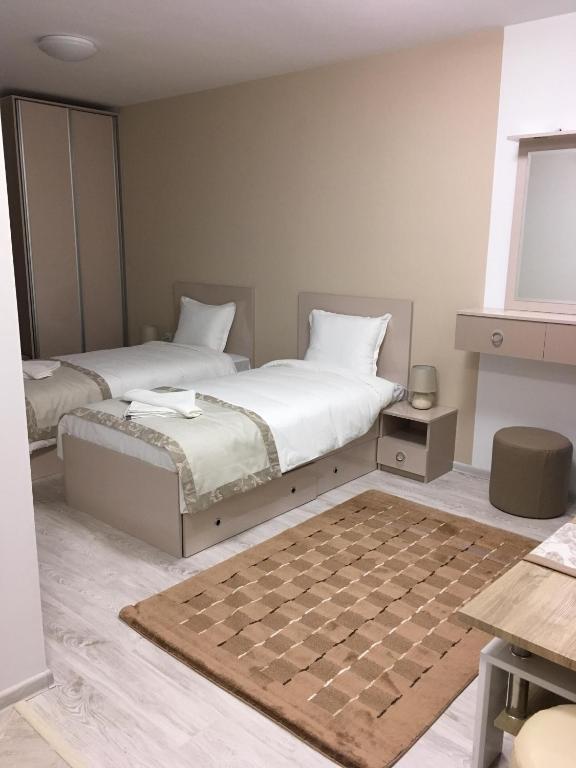 Postel nebo postele na pokoji v ubytování Apartment Park Sveti Vrach