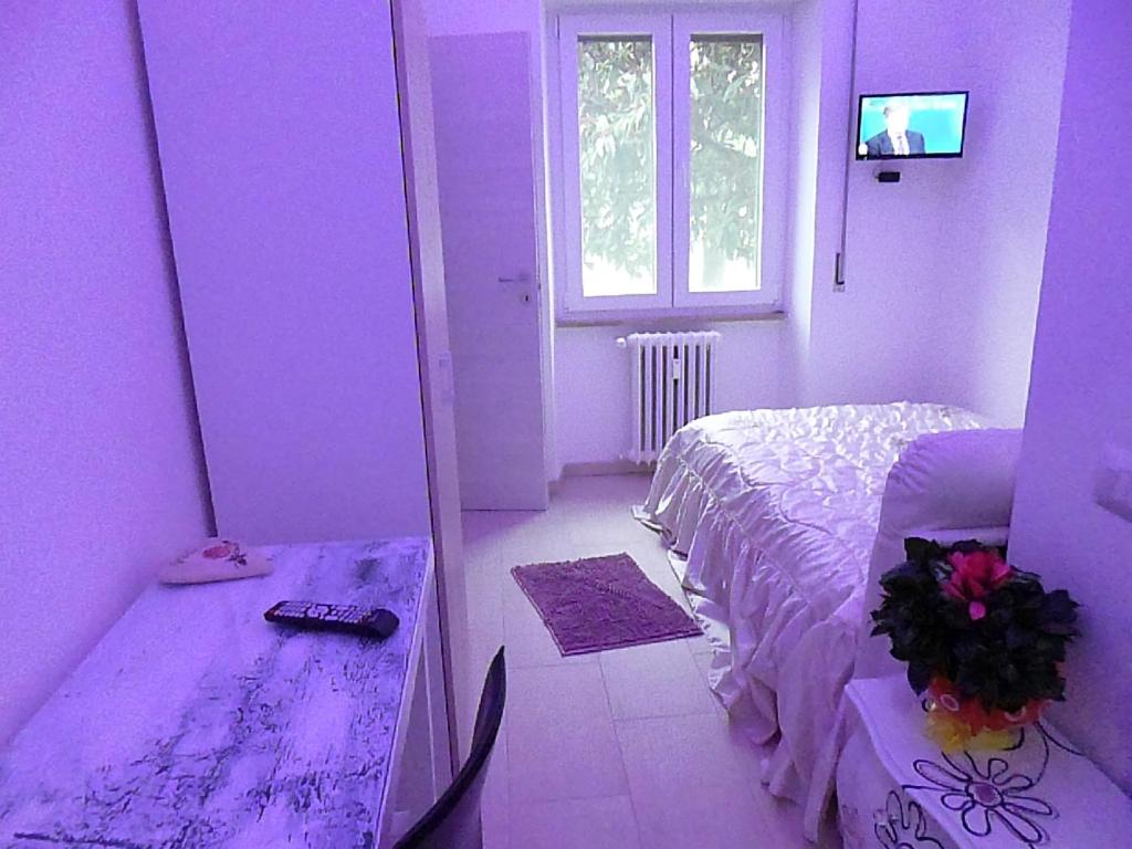 Postel nebo postele na pokoji v ubytování Monaco Rooms