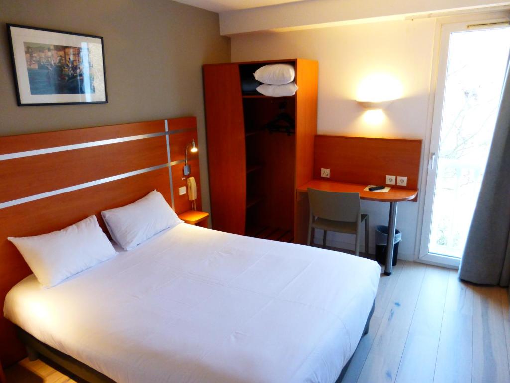 Postel nebo postele na pokoji v ubytování Hotel & Restaurant Heliotel