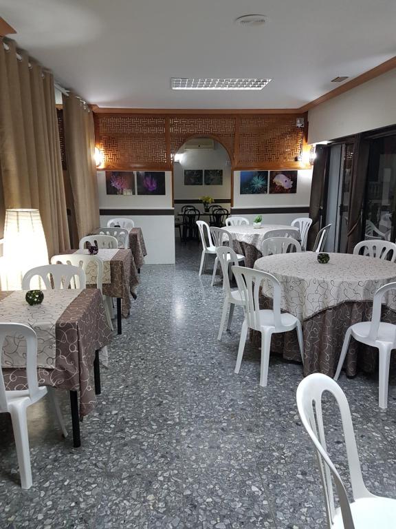 Reštaurácia alebo iné gastronomické zariadenie v ubytovaní Pension los Verdiales