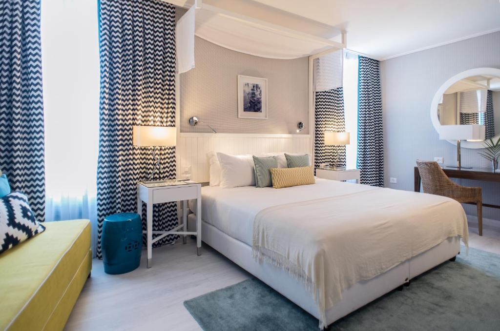 Postel nebo postele na pokoji v ubytování Melody Hotel - an Atlas Boutique Hotel